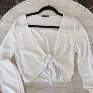 White long sleeve cross body top